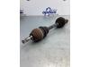 Front drive shaft, left from a Opel Zafira (M75) 1.8 16V Ecotec 2007