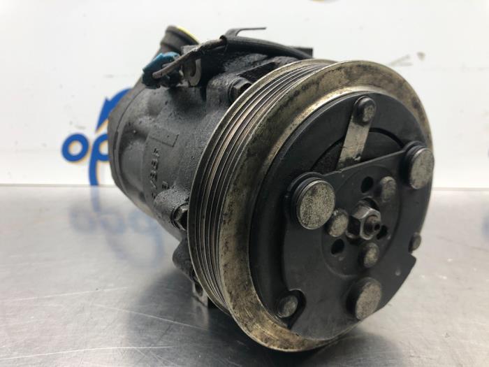 Używane Pompa klimatyzacji Opel Corsa C (F08/68) 1.2 16V Twin Port Cena € 35,00 Procedura marży oferowane przez Gebr Opdam B.V.
