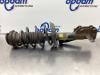 Front shock absorber rod, left from a Opel Astra J (PC6/PD6/PE6/PF6) 1.4 Turbo 16V 2010