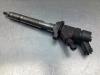 Injector (diesel) from a Ford Focus 2 Wagon 1.6 TDCi 16V 90 2009
