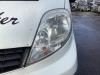 Headlight, left from a Renault Trafic New (FL) 2.5 dCi 16V 115 FAP 2009