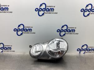 Used Headlight, left Volkswagen Polo IV (9N1/2/3) 1.2 12V Price € 65,00 Margin scheme offered by Gebr Opdam B.V.