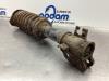 Front shock absorber rod, left from a Suzuki Wagon-R+ (RB) 1.3 16V 2002