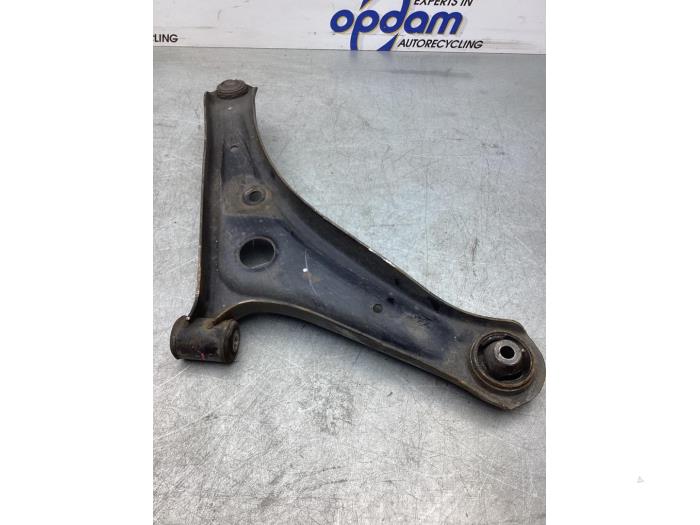 Front lower wishbone, left from a Mitsubishi Space Star (A0) 1.0 12V 2016