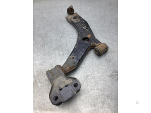 Used Front lower wishbone, left Ford Focus 3 Wagon 1.0 Ti-VCT EcoBoost 12V 100 Price € 40,00 Margin scheme offered by Gebr Opdam B.V.