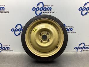 Used Space-saver spare wheel Daihatsu Cuore (L251/271/276) 1.0 12V DVVT Price € 50,00 Margin scheme offered by Gebr Opdam B.V.