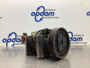 Usagé Pompe clim Nissan Micra (K11) 1.0 L,LX 16V Prix € 60,00 Règlement à la marge proposé par Gebr Opdam B.V.