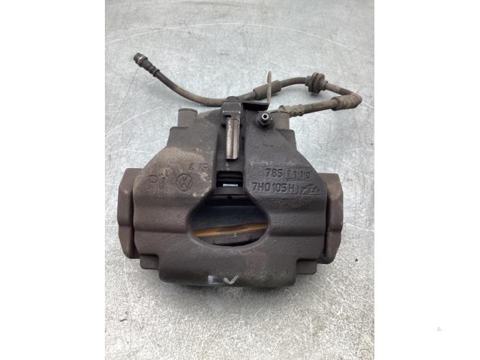 Front brake calliper, left from a Volkswagen Transporter T5 2.0 TDI DRF 2015