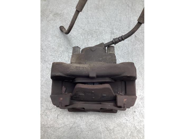 Front brake calliper, right from a Volkswagen Transporter T5 2.0 TDI DRF 2015
