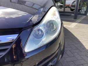 Used Headlight, left Opel Corsa D 1.2 16V Price € 100,00 Margin scheme offered by Gebr Opdam B.V.