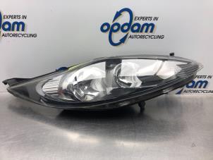 Used Headlight, right Ford Fiesta 6 (JA8) 1.25 16V Price € 150,00 Margin scheme offered by Gebr Opdam B.V.