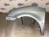 Front wing, left from a Volkswagen Touran (1T1/T2) 2.0 TDI 16V 140 2006