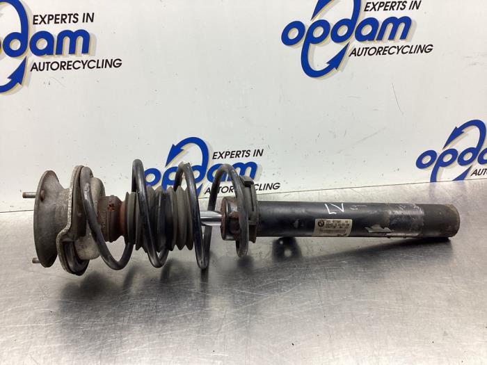Front shock absorber rod, left BMW 3 serie Touring 318i 16V - 31316772917