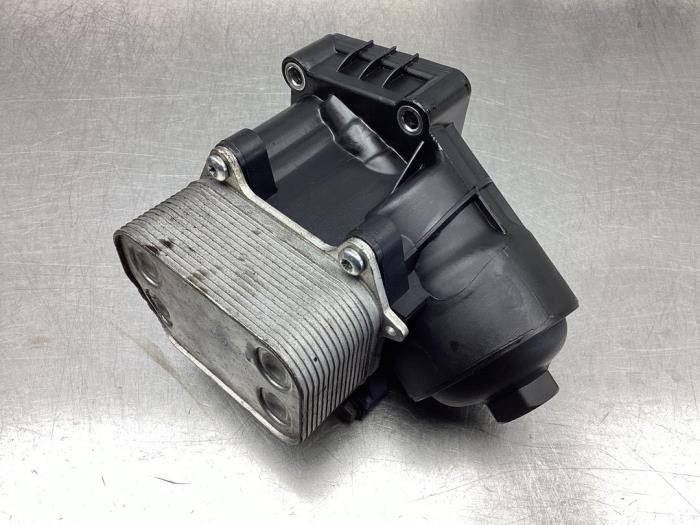Oil filter housing from a Seat Ibiza ST (6J8) 1.2 TDI Ecomotive 2011