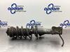 Front shock absorber rod, left from a Opel Astra H (L48) 1.6 16V 2007