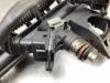 Injector (petrol injection) from a Renault Clio III (BR/CR) 1.2 16V 75 2009