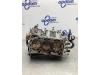 Cylinder head from a Mitsubishi Space Star (A0) 1.2 12V 2013