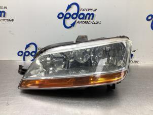 Used Headlight, left Fiat Idea (350AX) 1.4 16V Price € 50,00 Margin scheme offered by Gebr Opdam B.V.