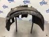Wheel arch liner from a BMW 5 serie (E60) 520i 16V 2010
