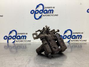 Used Rear brake calliper, left Nissan Almera Tino (V10M) 1.8 16V Price € 50,00 Margin scheme offered by Gebr Opdam B.V.