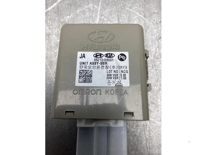 Seat belt reminder module from a Kia Picanto (JA) 1.0 12V 2019