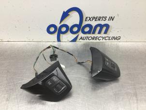 Used Steering wheel mounted radio control Opel Corsa D 1.3 CDTi 16V ecoFLEX Price € 30,00 Margin scheme offered by Gebr Opdam B.V.