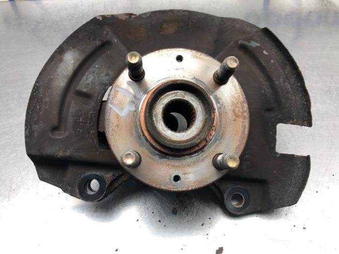 Knuckle, front left from a Hyundai Getz 1.4i 16V 2006