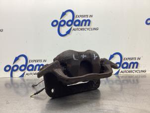 Used Front brake calliper, left Peugeot 407 SW (6E) 2.0 16V Price € 50,00 Margin scheme offered by Gebr Opdam B.V.