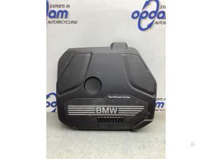 Usagé Couverture moteur BMW X1 (F48) sDrive 20i 2.0 16V Twin Power Turbo Prix € 40,00 Règlement à la marge proposé par Gebr Opdam B.V.