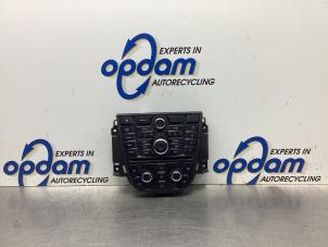 Used Radio control panel Opel Astra J Sports Tourer (PD8/PE8/PF8) 1.4 Turbo 16V Price € 75,00 Margin scheme offered by Gebr Opdam B.V.