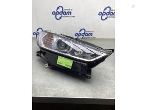 Used Headlight, right Ford Mondeo V 1.5 EcoBoost 16V Price € 350,00 Margin scheme offered by Gebr Opdam B.V.