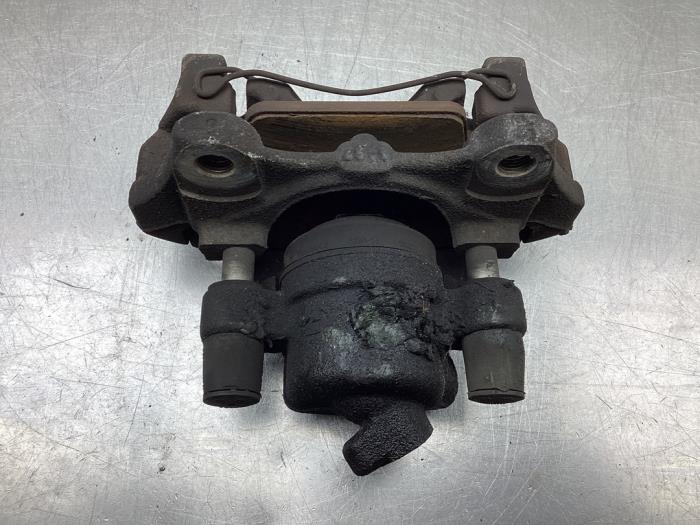 Front brake calliper, left from a Renault Clio IV (5R) 1.5 Energy dCi 90 FAP 2014
