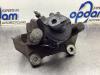 Front brake calliper, left from a Renault Clio IV (5R) 1.5 Energy dCi 90 FAP 2014