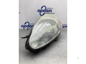Used Headlight, left Fiat Grande Punto (199) 1.4 Price € 50,00 Margin scheme offered by Gebr Opdam B.V.