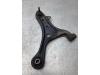 Front lower wishbone, right from a Toyota iQ 1.0 12V VVT-i 2009