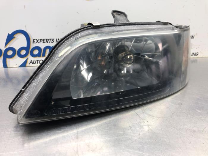 Headlight, left from a Mitsubishi Space Star (DG) 1.3 16V 2003