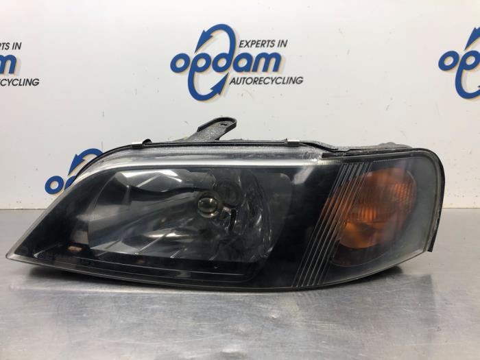 Headlight, left from a Mitsubishi Space Star (DG) 1.3 16V 2003