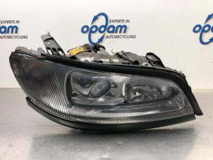 Used Headlight, right Opel Omega B Caravan (21/22/23) 2.2 DTI 16V Price € 125,00 Margin scheme offered by Gebr Opdam B.V.