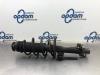 Front shock absorber rod, left from a Volkswagen Polo V (6R) 1.2 TSI 16V BlueMotion Technology 2014