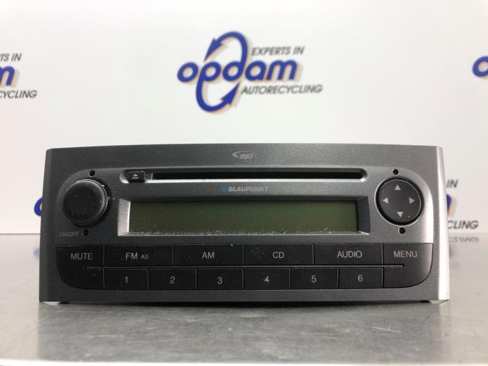 Radio CD player from a Fiat Grande Punto (199) 1.4 16V 2009