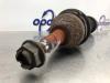 Front drive shaft, left from a Opel Zafira (M75) 2.2 16V Direct Ecotec 2006