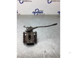 Usados Pinza de freno derecha detrás Seat Leon ST (5FF) 1.6 TDI Ecomotive 16V Precio € 50,00 Norma de margen ofrecido por Gebr Opdam B.V.