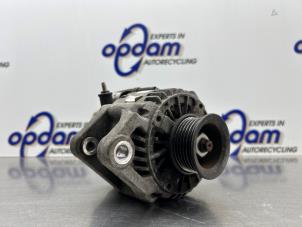 Usagé Dynamo Daihatsu Cuore (L251/271/276) 1.0 12V DVVT Prix € 50,00 Règlement à la marge proposé par Gebr Opdam B.V.