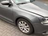 Volkswagen Jetta IV (162/16A) 1.2 TSI Blotnik prawy przód