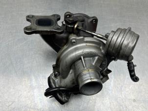 Turbo van een Ford Focus 3 1.0 Ti-VCT EcoBoost 12V 100 2013