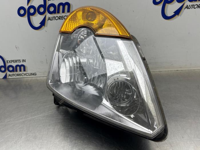 Używane Reflektor prawy Renault Modus/Grand Modus (JP) 1.2 16V Cena € 75,00 Procedura marży oferowane przez Gebr Opdam B.V.