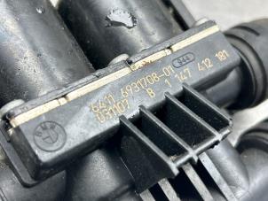 Extra vattenpump från en BMW 5 serie (E60) 520i 24V 2003