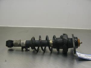 Used Rear shock absorber rod, left BMW Mini One/Cooper (R50) 1.6 16V Cooper Price € 30,00 Margin scheme offered by Gebr Opdam B.V.