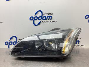 Used Headlight, left Ford Focus 2 1.6 16V Price € 40,00 Margin scheme offered by Gebr Opdam B.V.