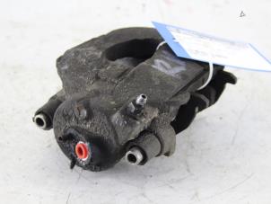 Usados Pinza de freno derecha delante Seat Ibiza ST (6J8) 1.2 TDI Ecomotive Precio € 25,00 Norma de margen ofrecido por Gebr Opdam B.V.